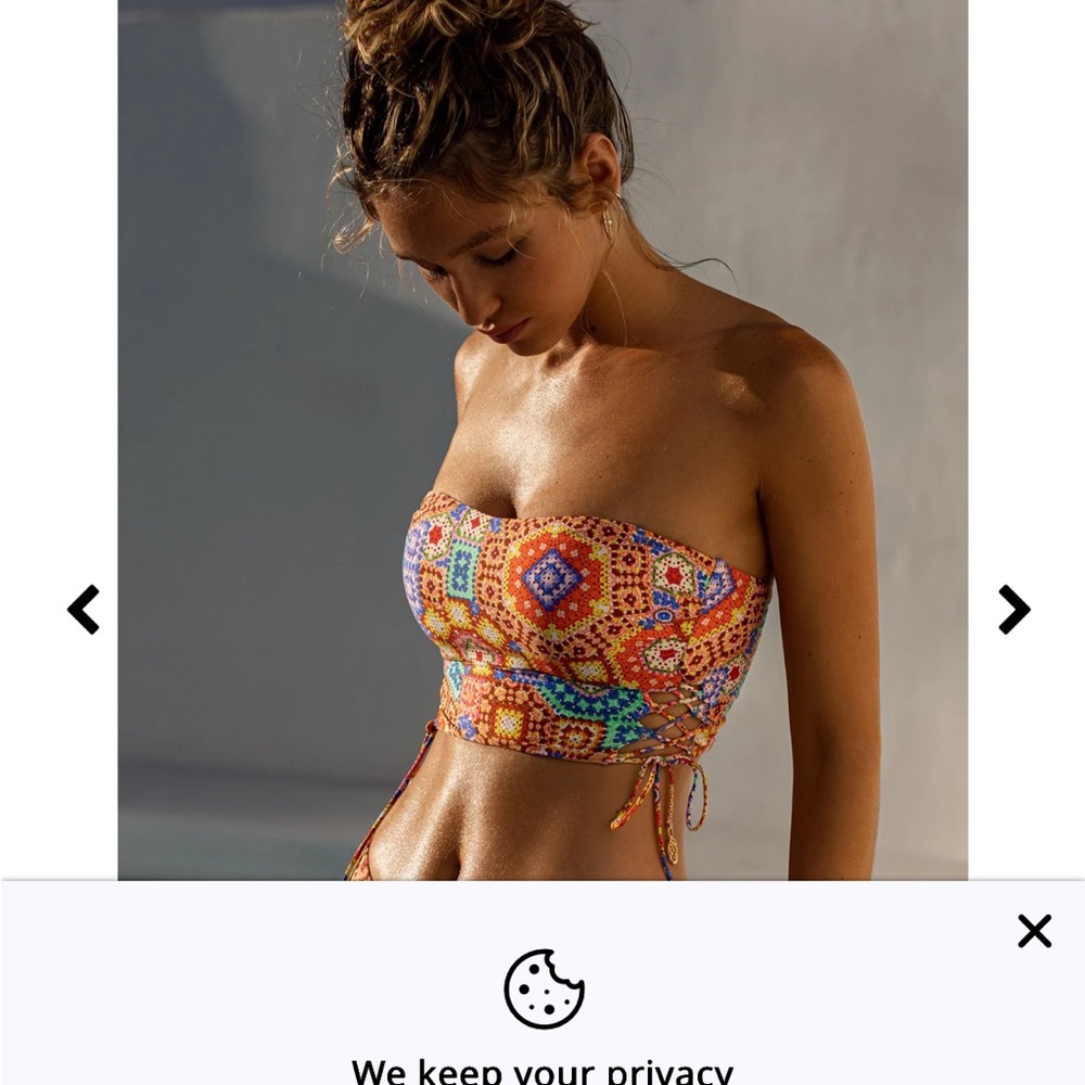 Luli Fama Colorful swim top.